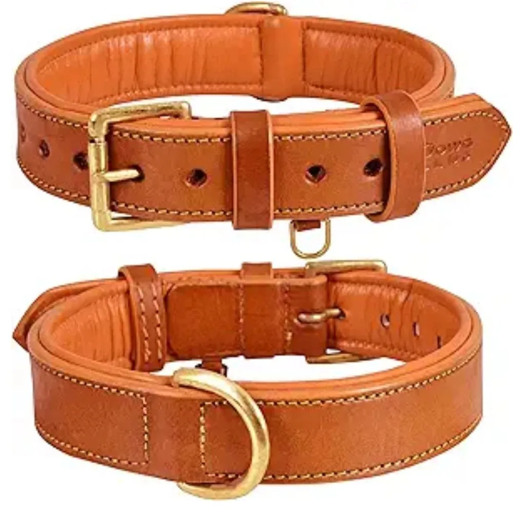 This premium dog collar combines timeless style with practical functionality. Crafted from supple taupe leather, it features contrast stitching for added durability and visual appeal. The antique brass-tone quick-release buckle ensures easy wear, while the matching D-ring provides secure leash attachment. Perfect for pet owners who appreciate quality craftsmanship and sophisticated design, this collar offers both comfort for your dog and lasting durability for daily adventures.